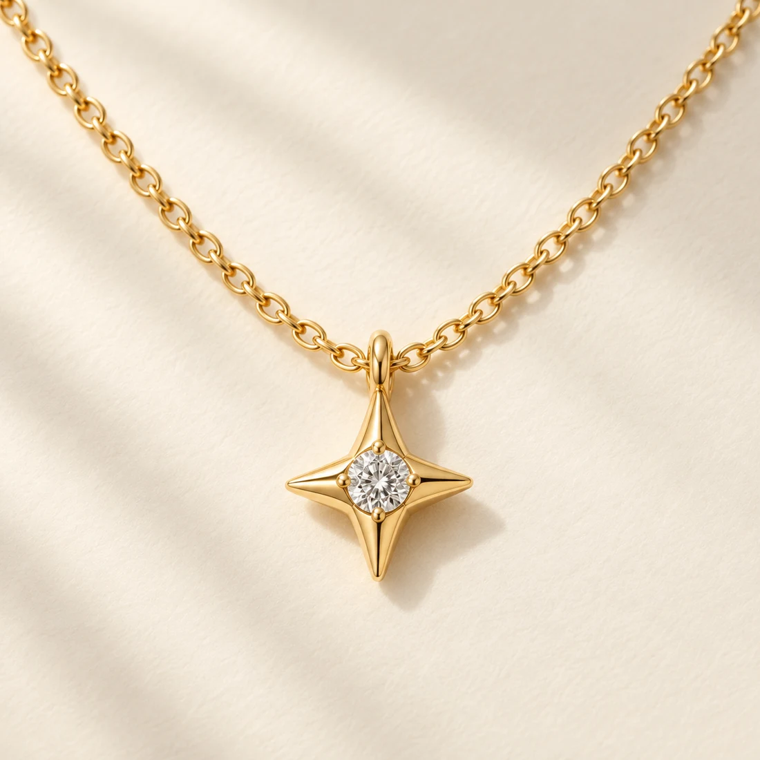 Hoshi Spark Necklace: close-up of the Gold / Clear pendant