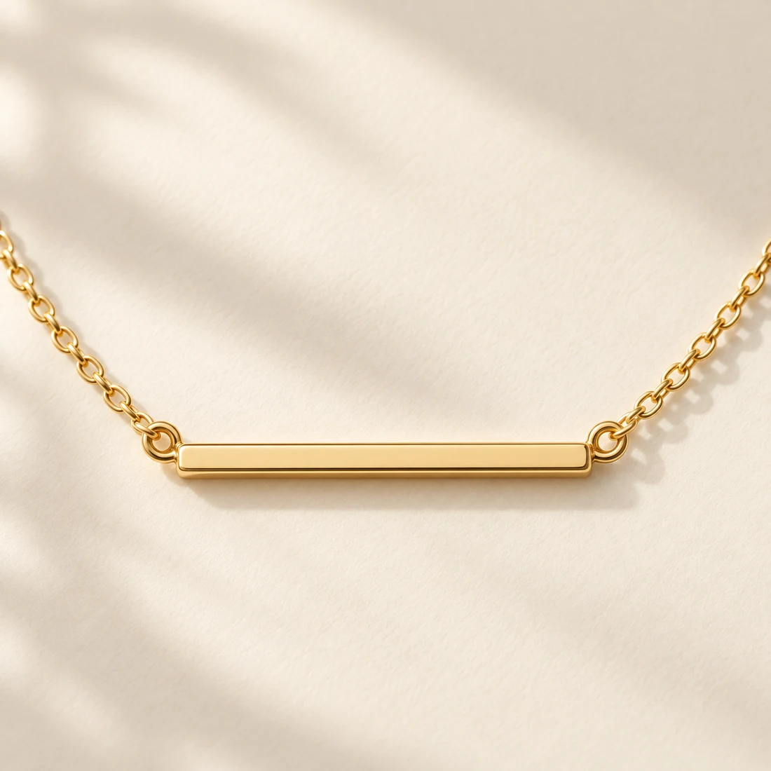 Nagi Bar Necklace: close-up of the Gold pendant