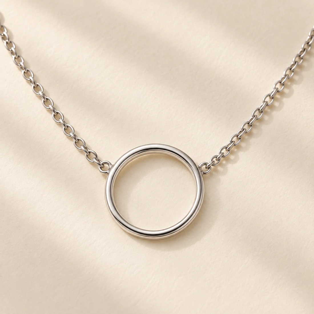 Maru Circle Necklace: close-up of the Silver pendant